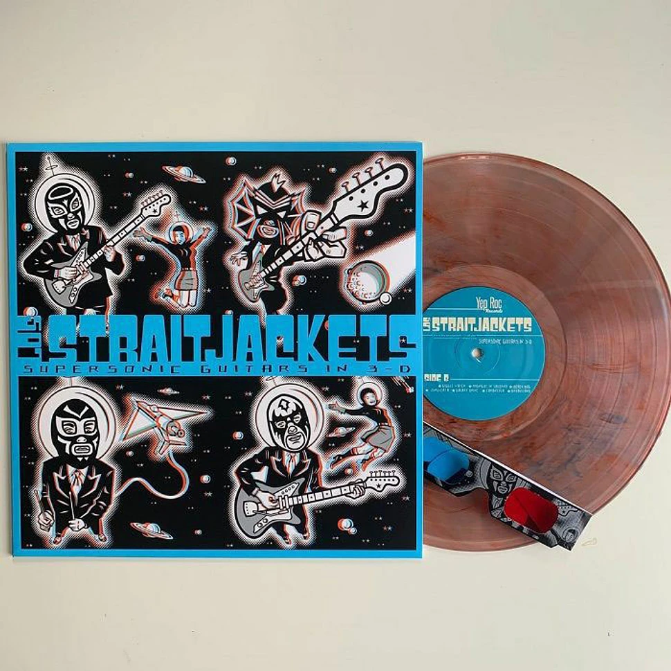 Los Straitjackets - Supersonic Guitars In 3-D Clear With Red & Blue Swirl Vinyl Edition